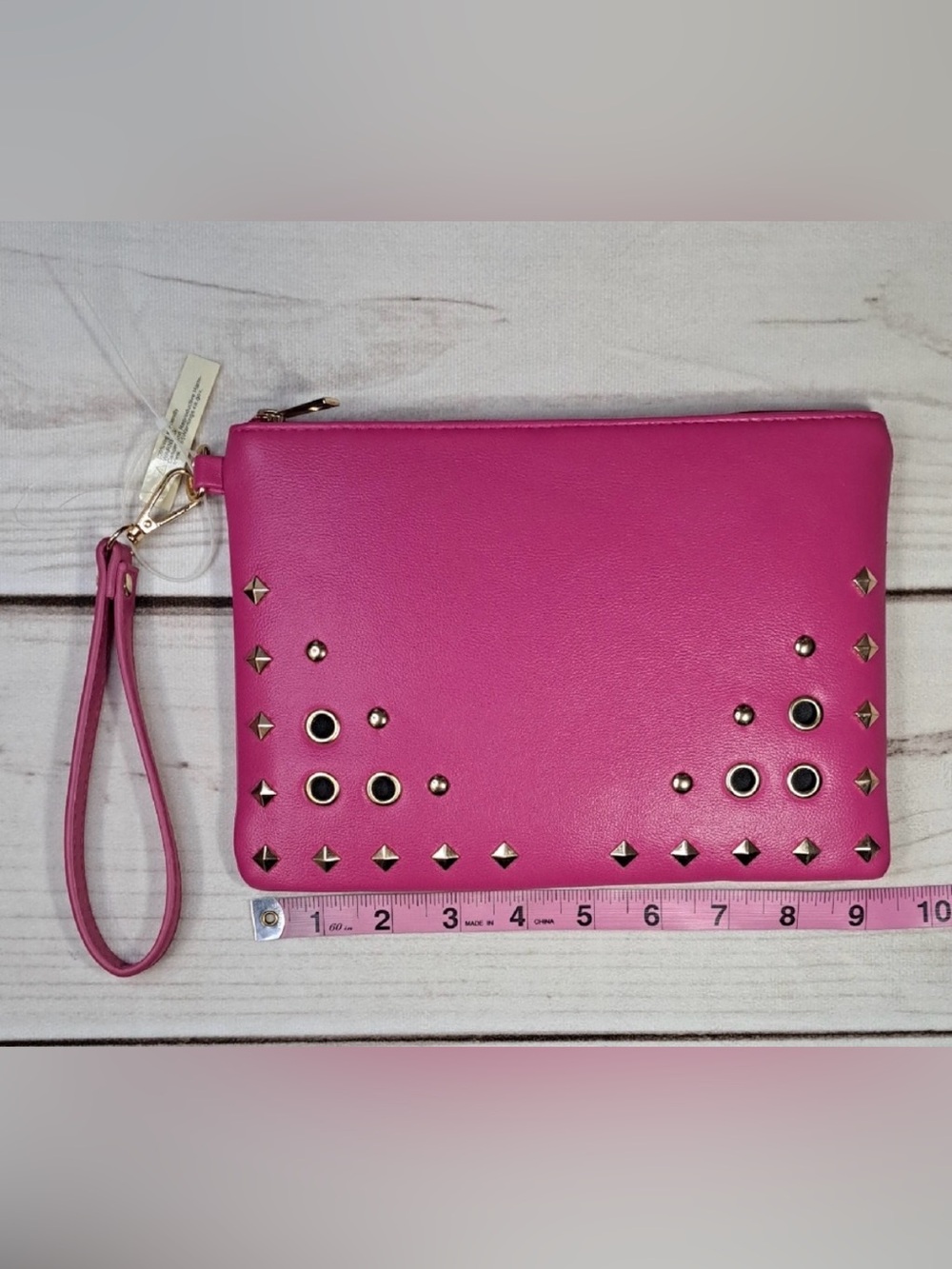 Pink studded wristlet like new